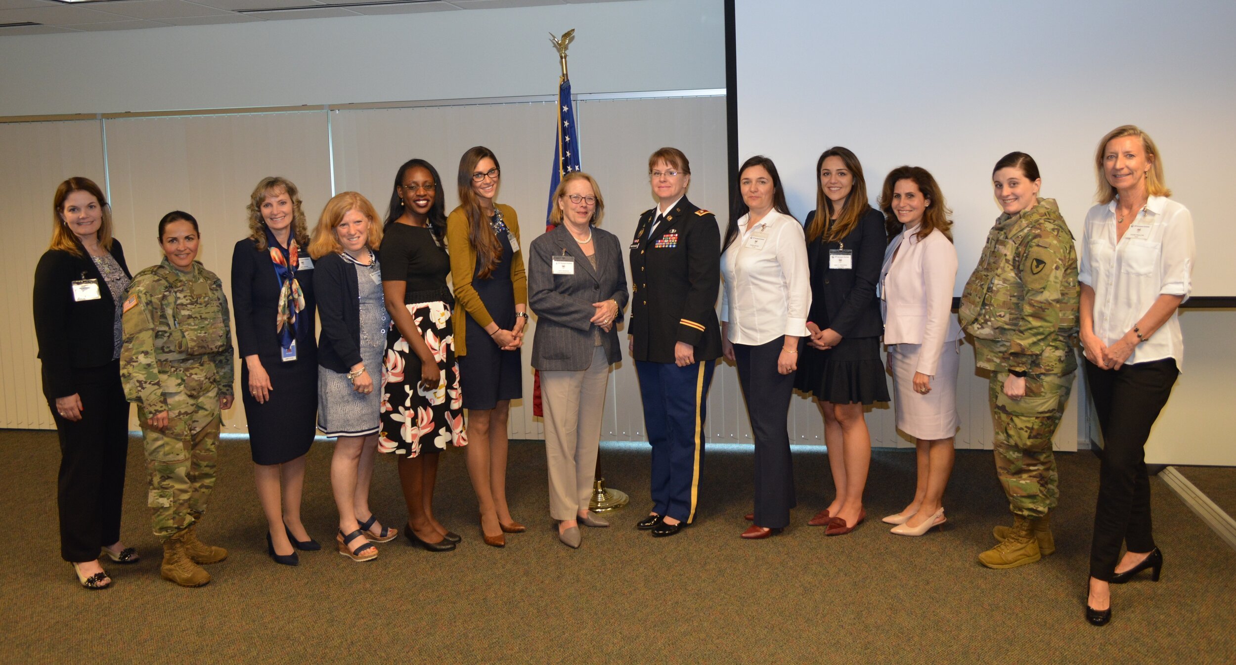 Krause-Bencal (third from right) poses with other members of the Women in Defense Greater Boston chapter and U.S. Representative Nicola Tsongas, center, in 2018.